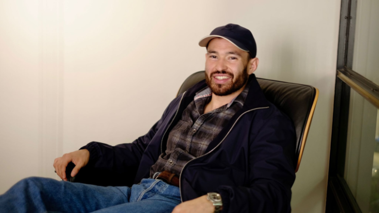 Companion ai founder Freddy del Barrio relaxing in an armchair